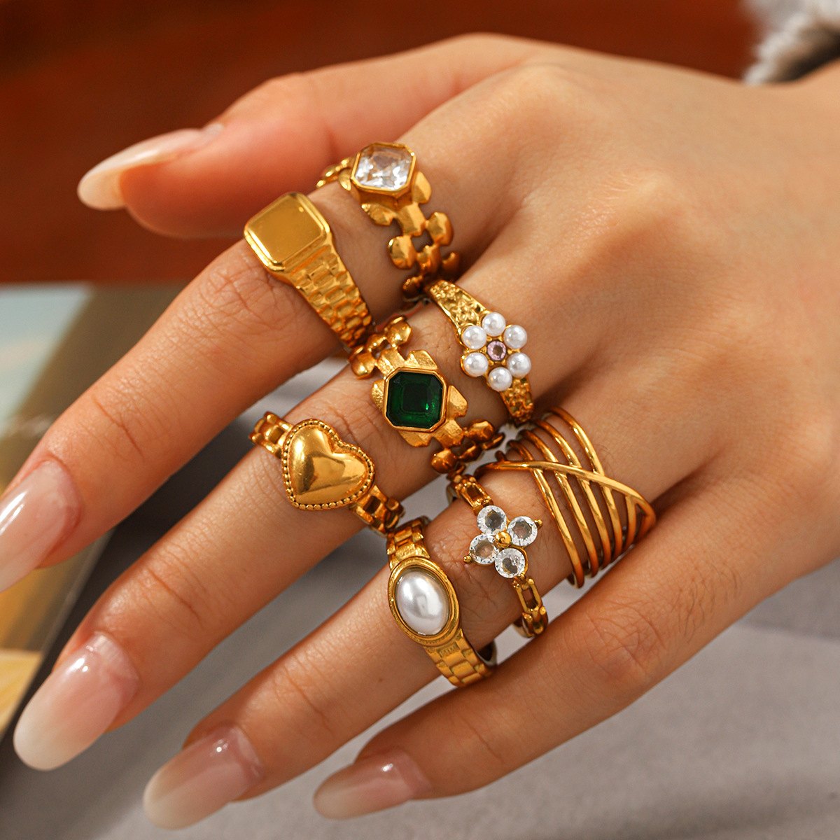 Stack of gold-plated rings by Luli Jewels